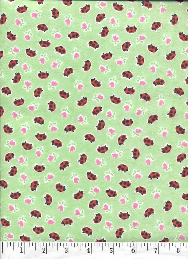 Lady bugs on a green background.