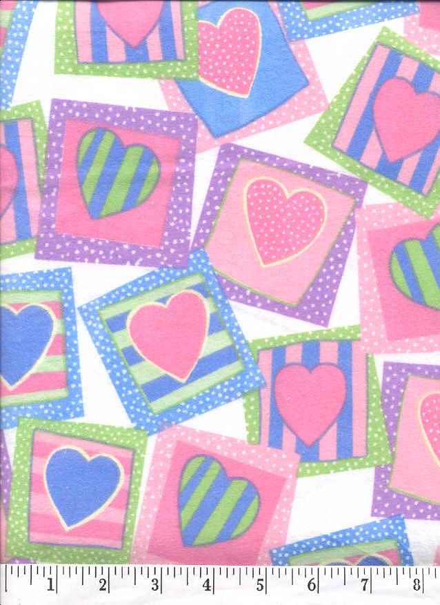 Hearts in a random block pattern fills this soft flannel fabric.