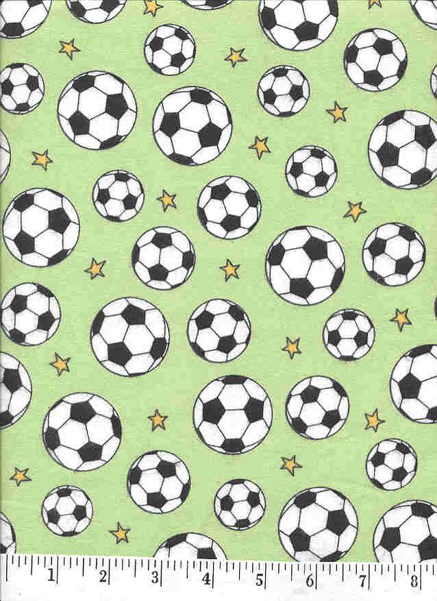 Soccer balls and stars on a green background.