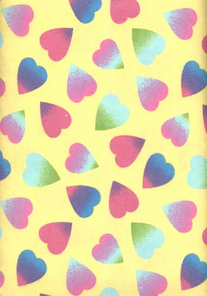 Beautiful soft flannel with rainbow colored hearts on a  yellow background.