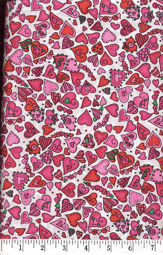 Pink and red hearts dance across this fabric.