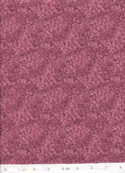 Blender fabric with tiny pink flowers on a darker raspberry pink background.