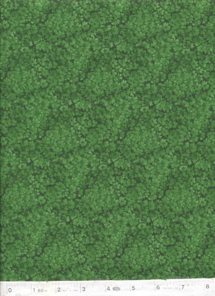 Blender fabric with tiny light green flowers on a darker green background.