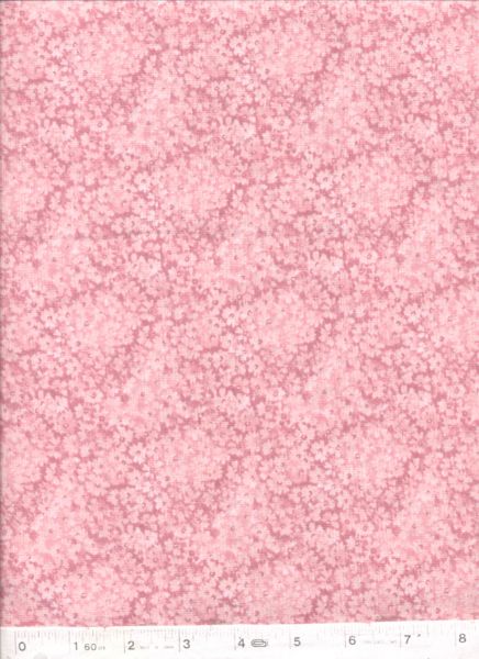 Blender fabric with tiny pale pink flowers on a darker pink background.