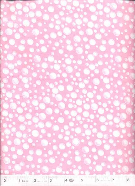 This is a super soft warm flannel with white bubbles on a pink background.