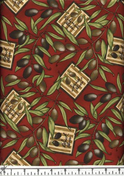 This fabric features beautiful ripe olives and branches on a rust red background.